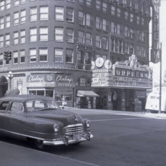 Orpheum Theatre Seattle, Washington with Nash Airflyte Statesman Super Sedan Parked Nearby